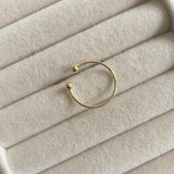 Gold Dainty Ball ring,  925 sterling silver Details: Adjustable one sizeTransform your look with our Gold Dainty Ball Ring. This elegant piece is crafted from sterling silver and coated with 14k gold, adding a touch of luxury to any outfit. With its delicate yet eye-catching design, this ring will be a timeless addition to your jewelry collection. 925 sterling silver Details: Adjustable one size