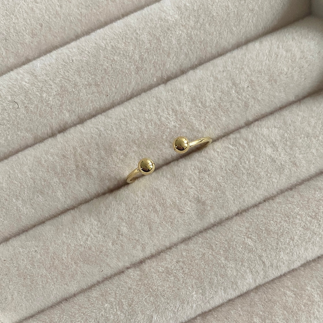 Gold Dainty Ball ring,  925 sterling silver Details: Adjustable one sizeTransform your look with our Gold Dainty Ball Ring. This elegant piece is crafted from sterling silver and coated with 14k gold, adding a touch of luxury to any outfit. With its delicate yet eye-catching design, this ring will be a timeless addition to your jewelry collection. 925 sterling silver Details: Adjustable one size