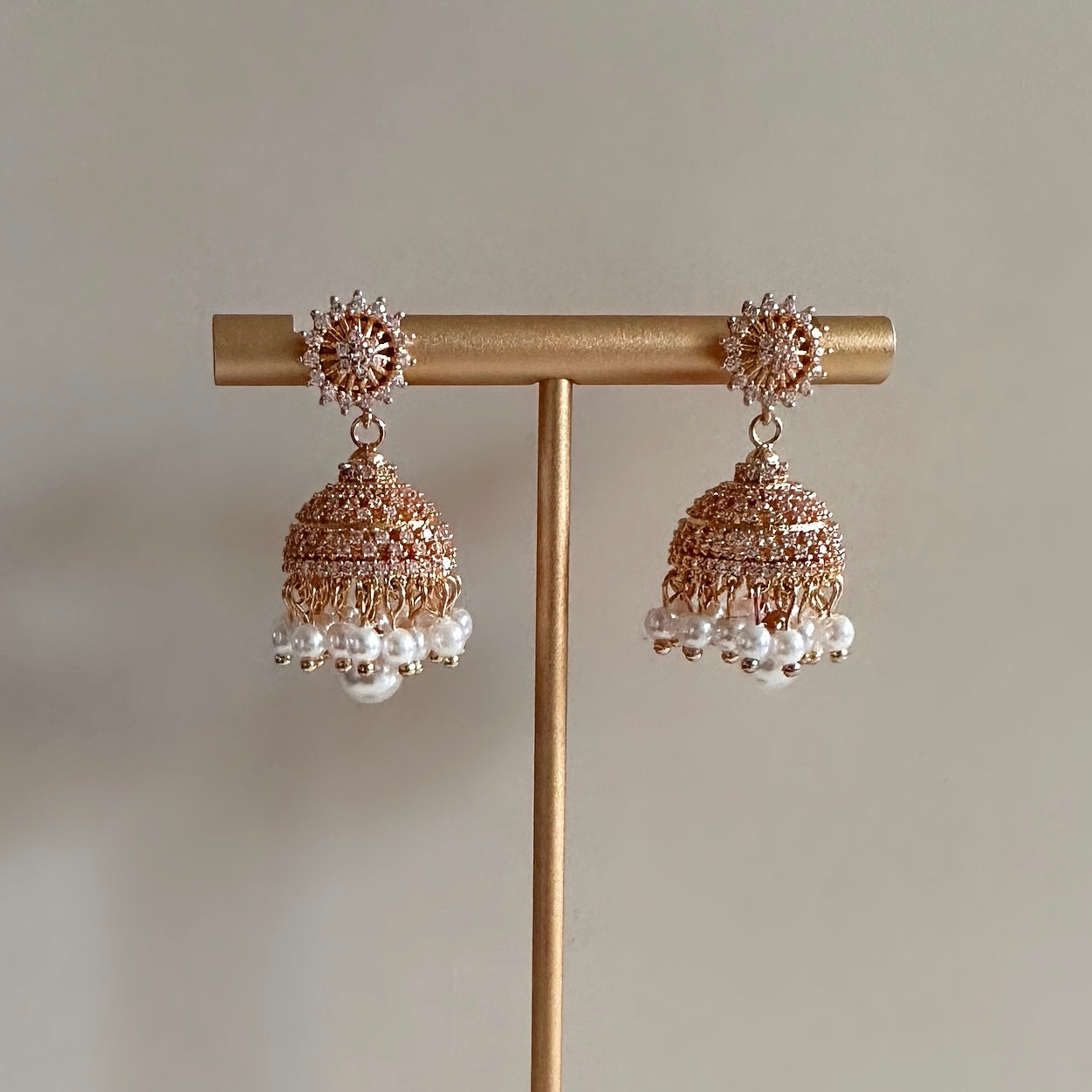 Small jhumka gold on sale earrings