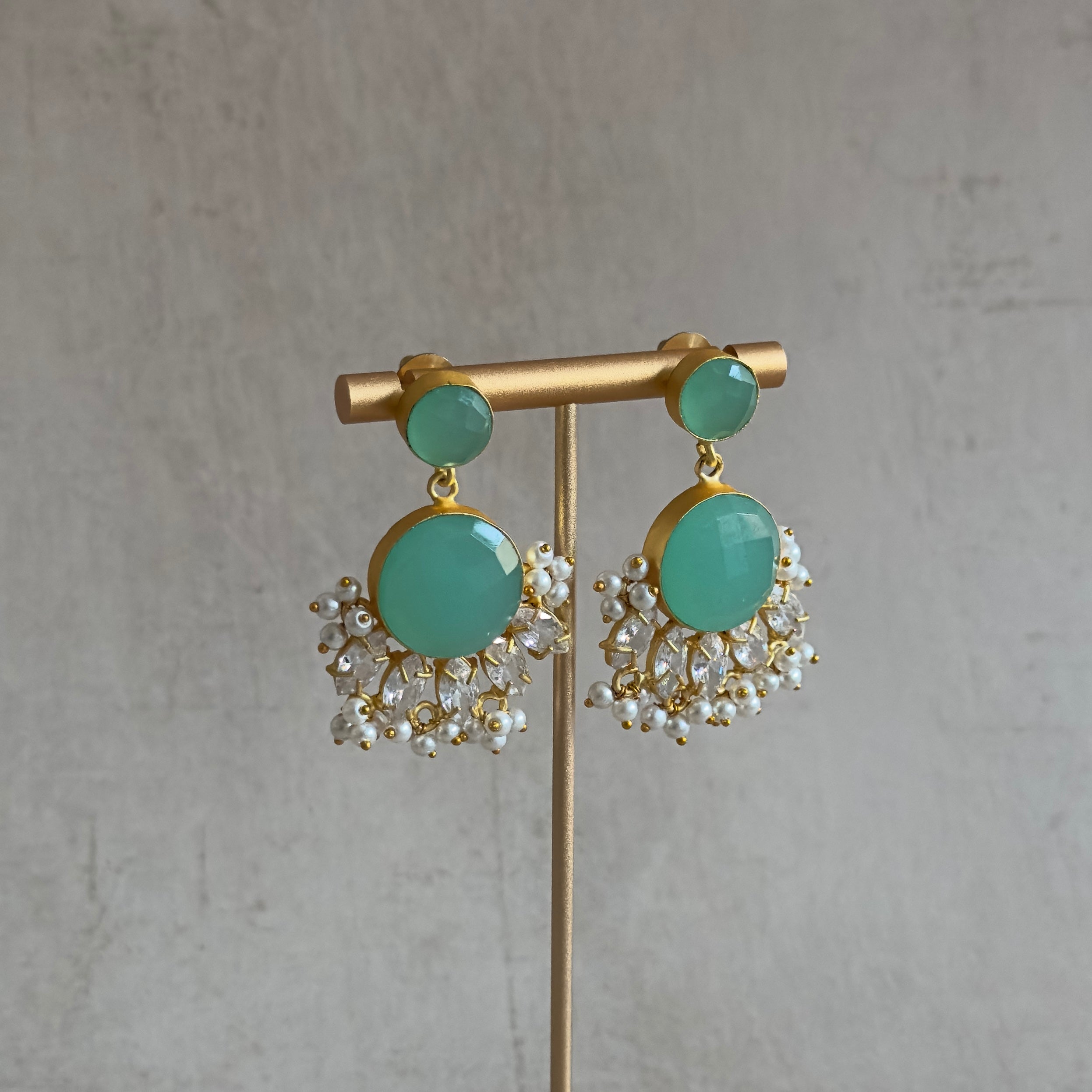 Indulge in elegance with our Marina Crystal Drop Earrings. The vibrant aquamarine and stunning CZ crystals will add a touch of glamour to any outfit. Elevate your style and make a statement with these mesmerizing earrings!