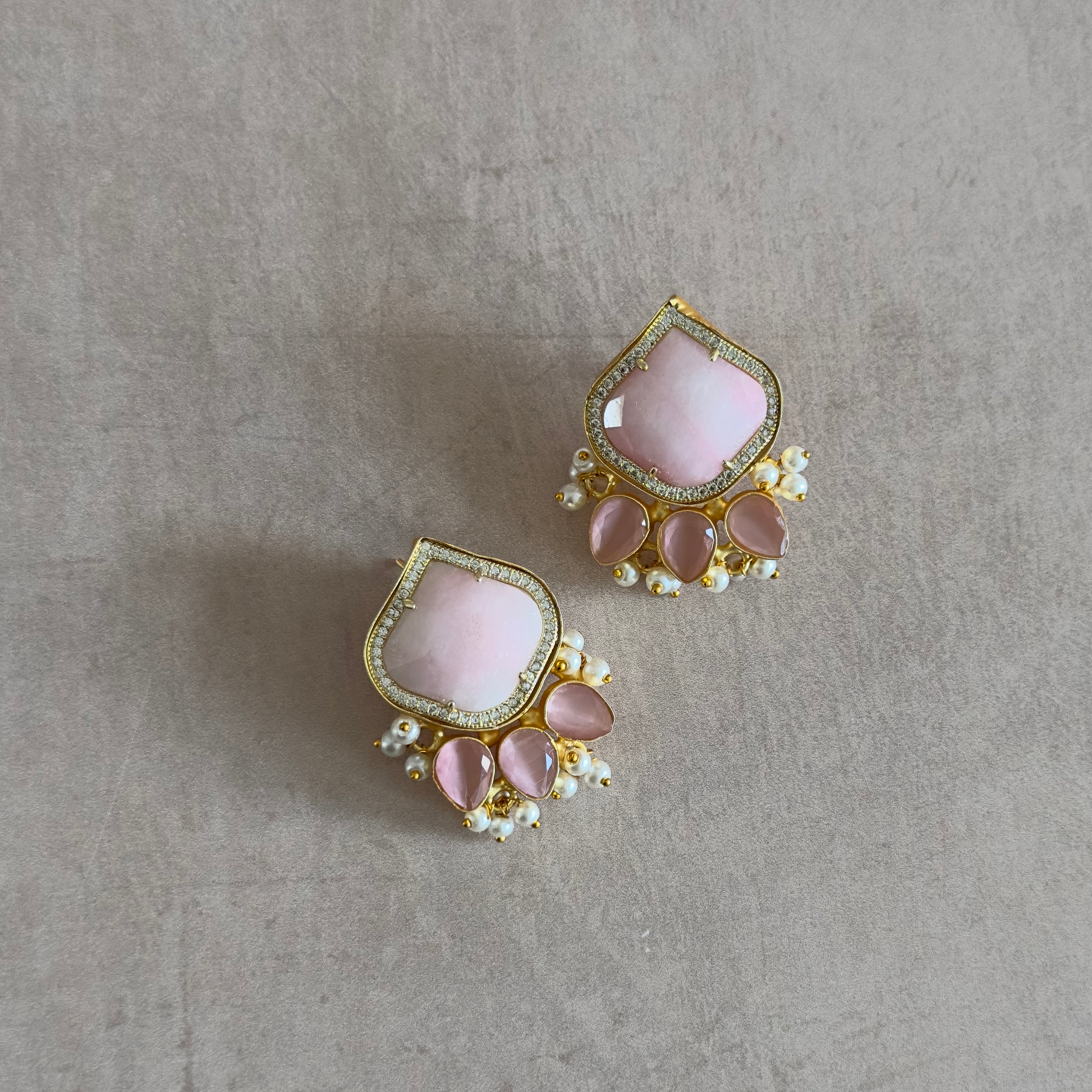 Add a splash of sweetness to your look with our Aria Pink Stud Earrings! These sherbet pink studs are a classic addition to any outfit, perfect for adding a pop of color. Get ready to stand out with these playful earrings!