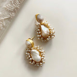 These elegant Baroque Pearl Earrings feature a unique baroque pearl for a timeless look. Every pearl is one-of-a-kind, making each pair imperceptibly different.  These earrings will make a perfect addition to any wardrobe.  Earring drop 4.5cm Shape of pearl may vary
