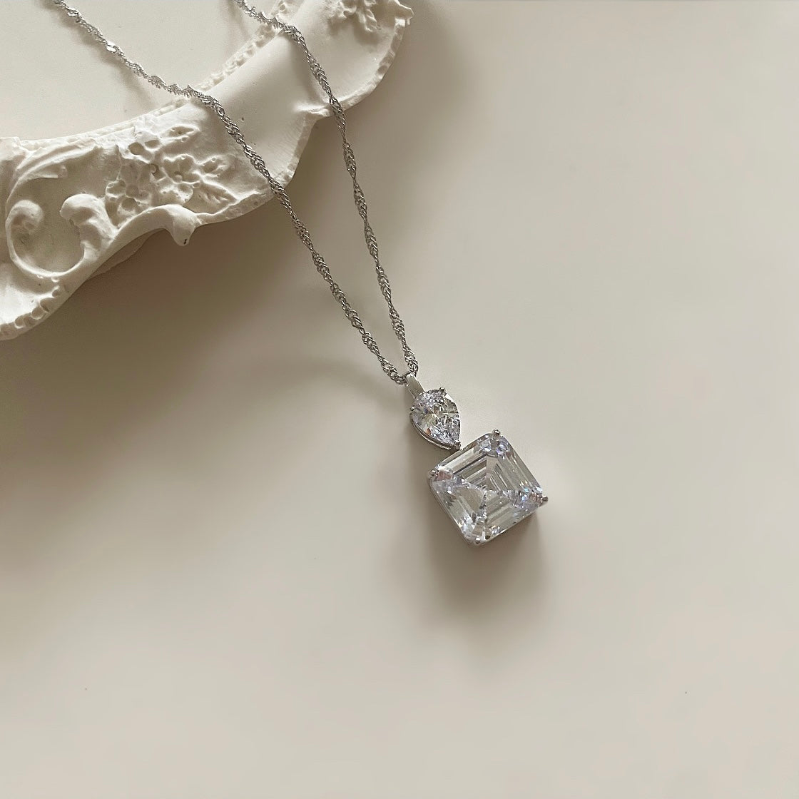 This beautiful Sterling Silver necklace features stunning crystal zirconia that will sparkle and shine all day. Expertly cut and polished to a high luster, the zirconia makes a bold statement without sacrificing comfort and elegance. Perfect for any occasion. Pair with crystal earrings for a complete look.  Necklace drop 23cm