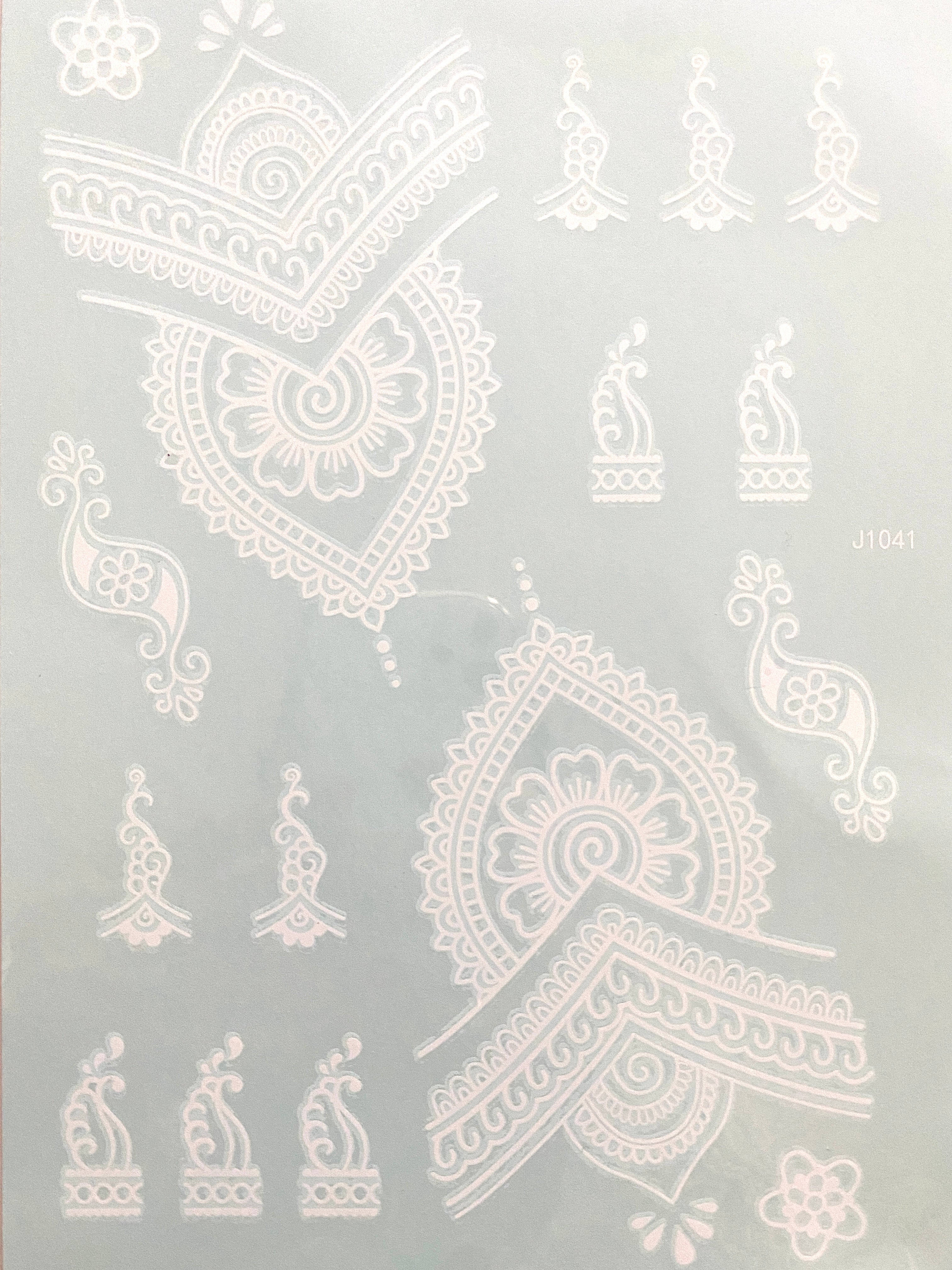 Reem Henna Tattoo aids in the application of henna tattoos, utilising transfer paper to apply designs in a traditional, white colour. The paper material is easy to use, allowing a quick and simple transfer of henna designs with stunning results. Perfect for weddings, parties, festivals & more.  Details: White Design is for both hands.